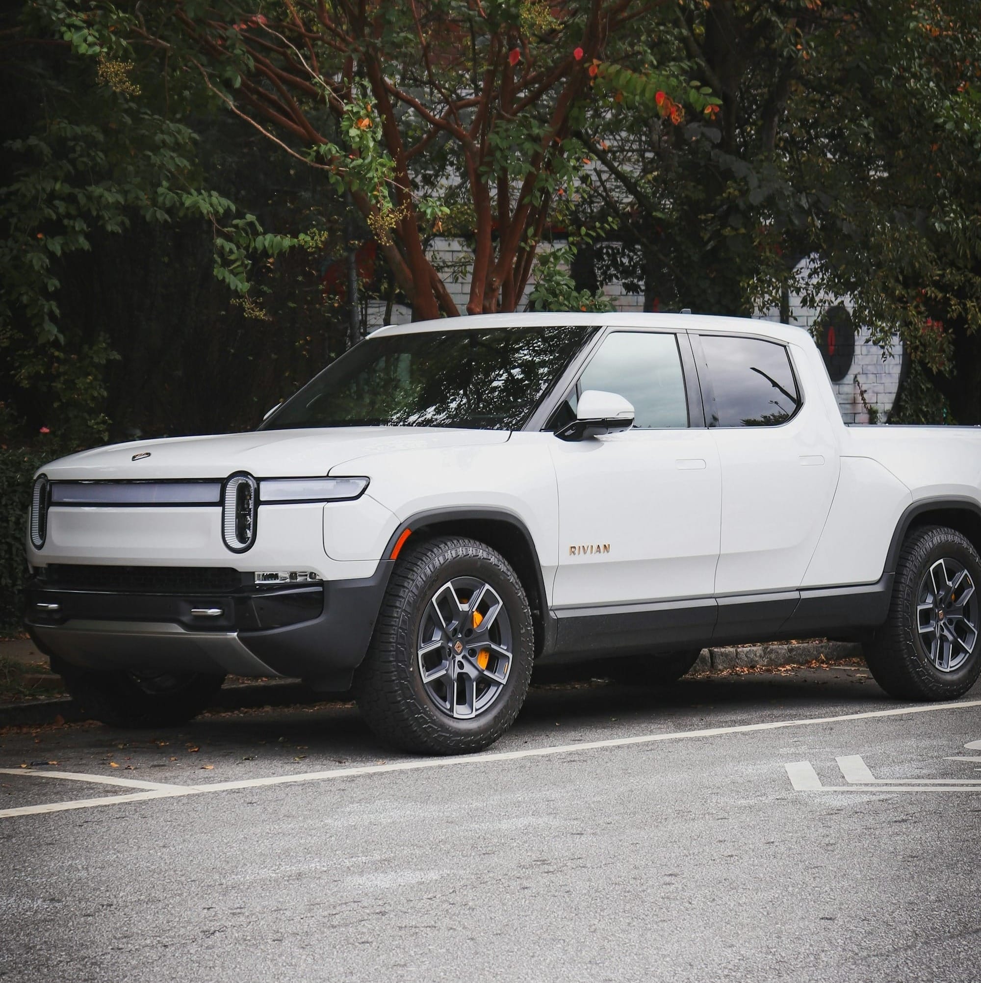 a white truck parked in a parking lot