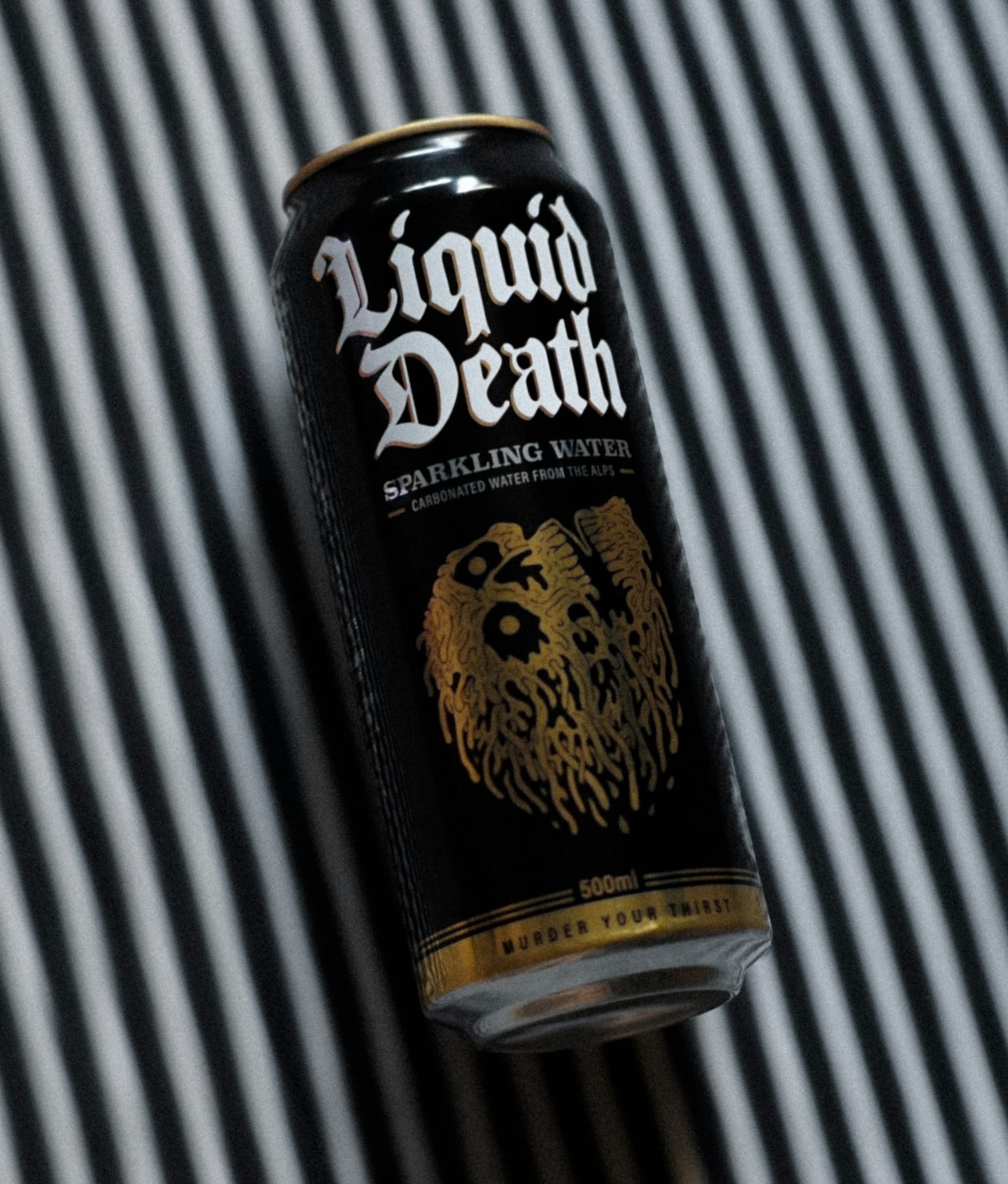 a can of liquid sitting on top of a table